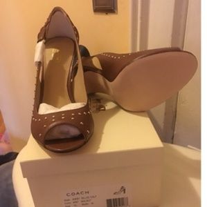 Brand new never worn Coach shoes